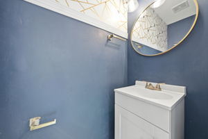 Half bathroom off of kitchen