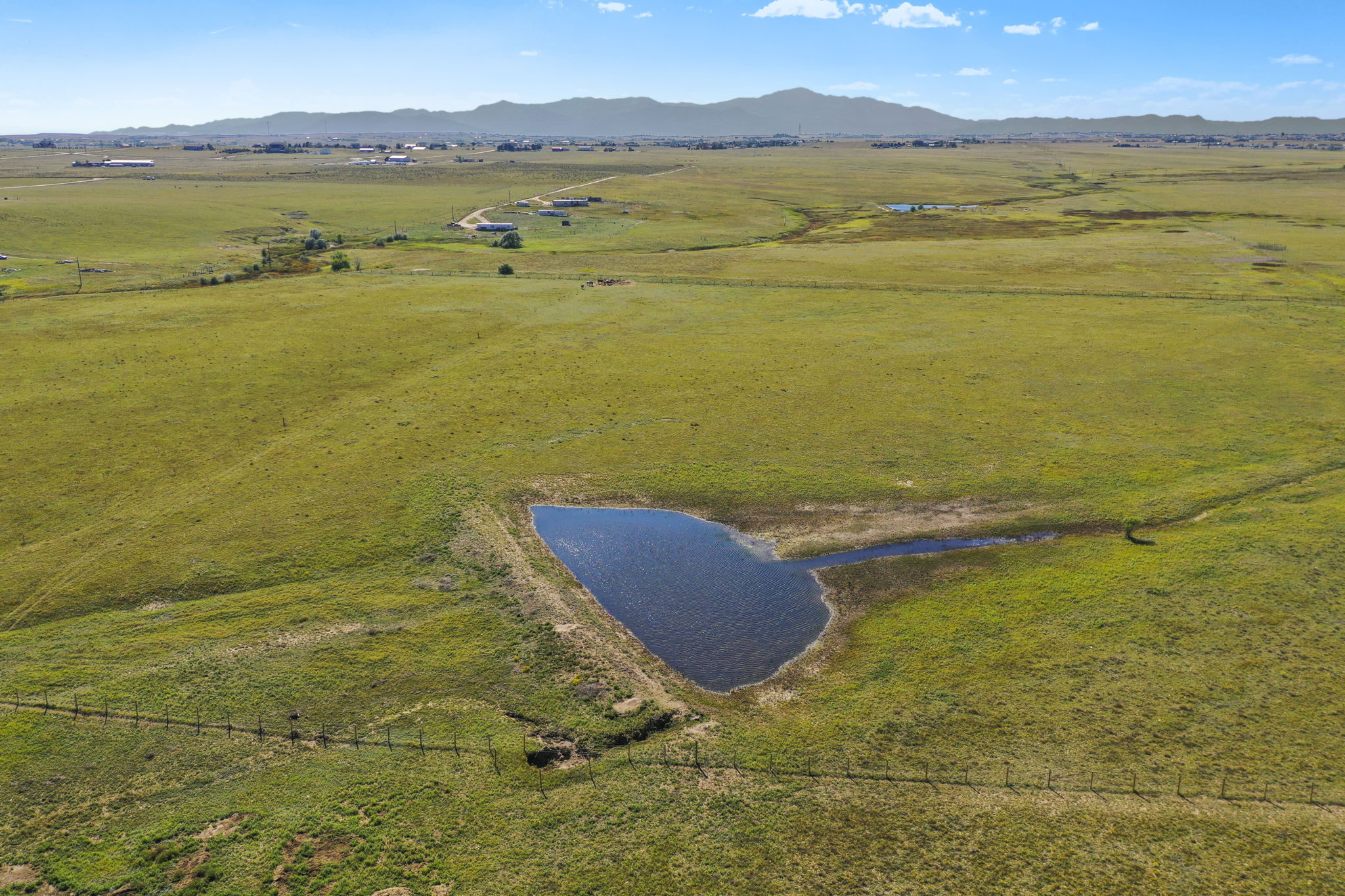 Aerial view with seasonal pond