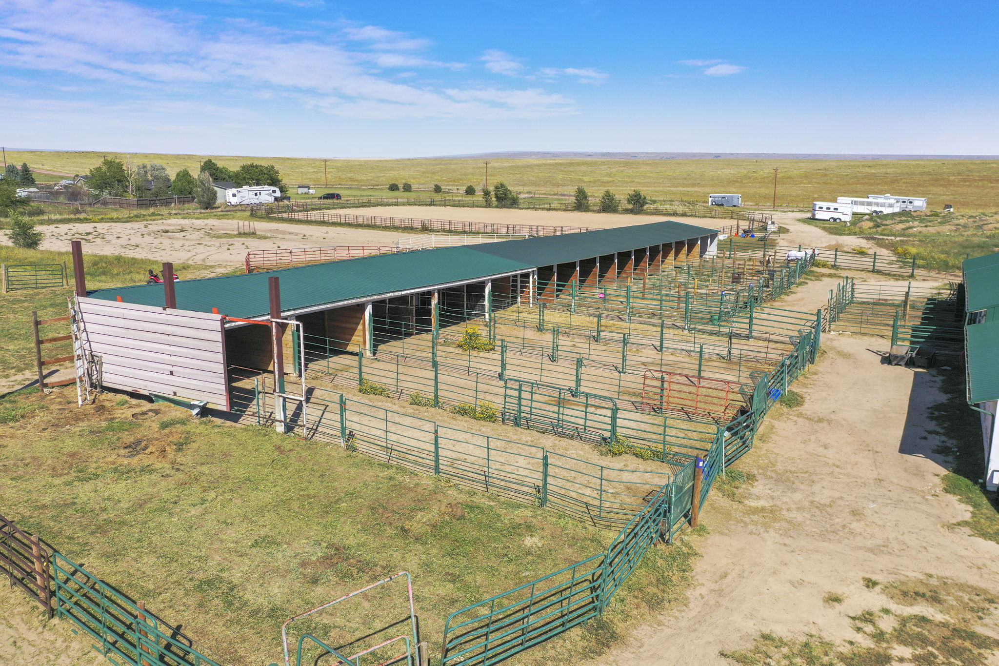 Lean-to shed row with runs