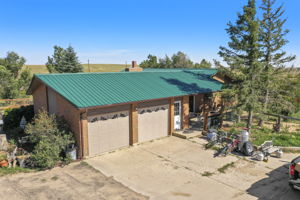 Main home driveway and 2 car garage