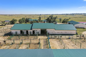 Primary stable with stalls/runs & heated stalls/wash area