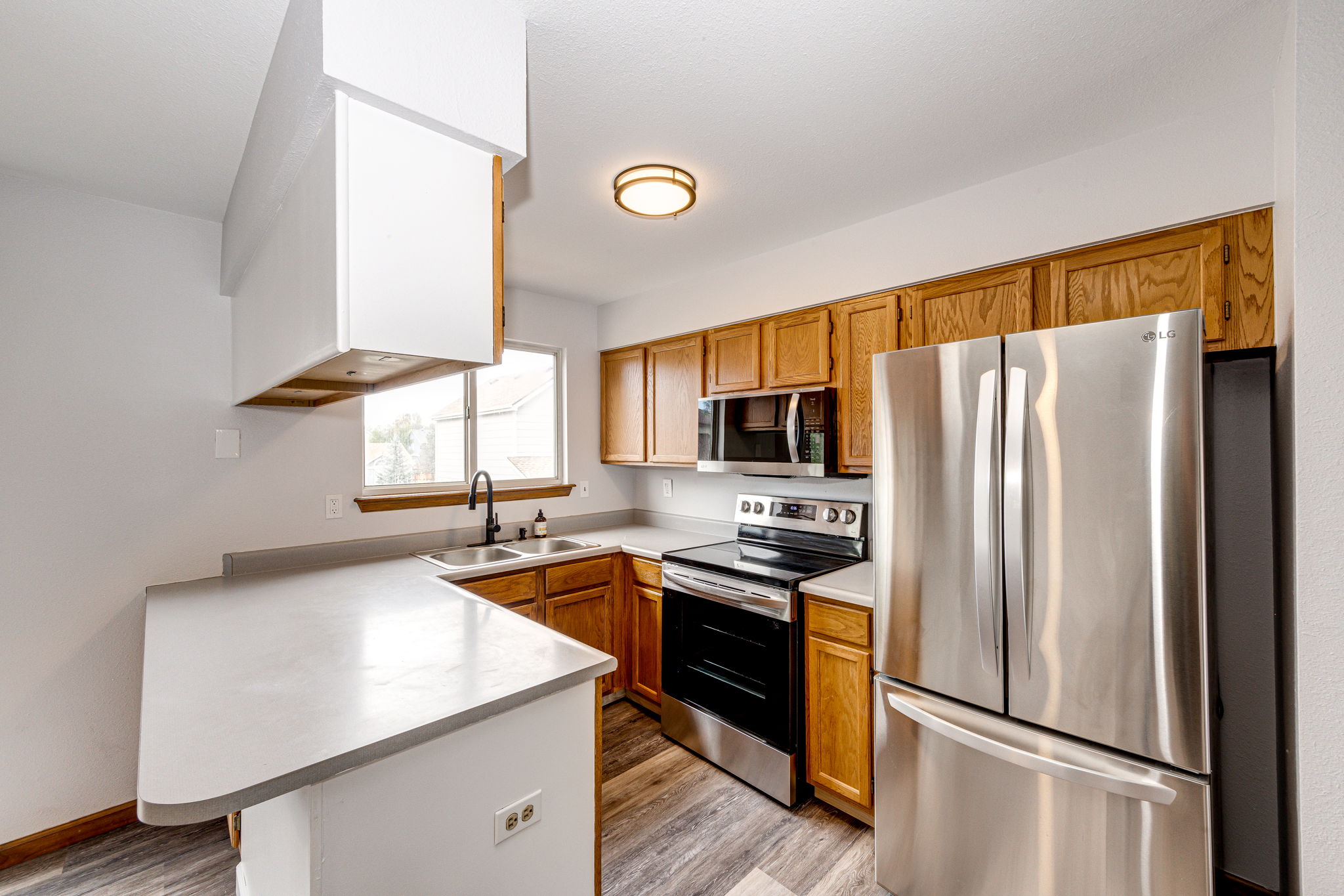 Spacious kitchen with all new stainless steel appliances