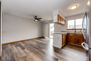 Eat-in space off of the kitchen with patio doors leading out onto your upper level deck area