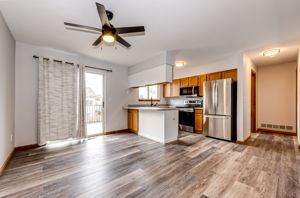 View of the eat-in space off of the kitchen with brand new flooring