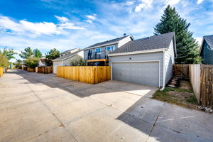 View of the back of the home and alley