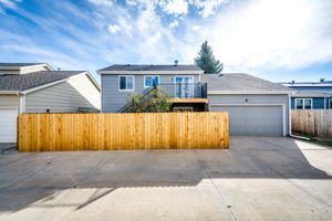 Alley access, 2 car garage and a new privacy fence all around