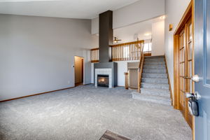 View as you enter the home. Vaulted ceiling and new carpet throughout!