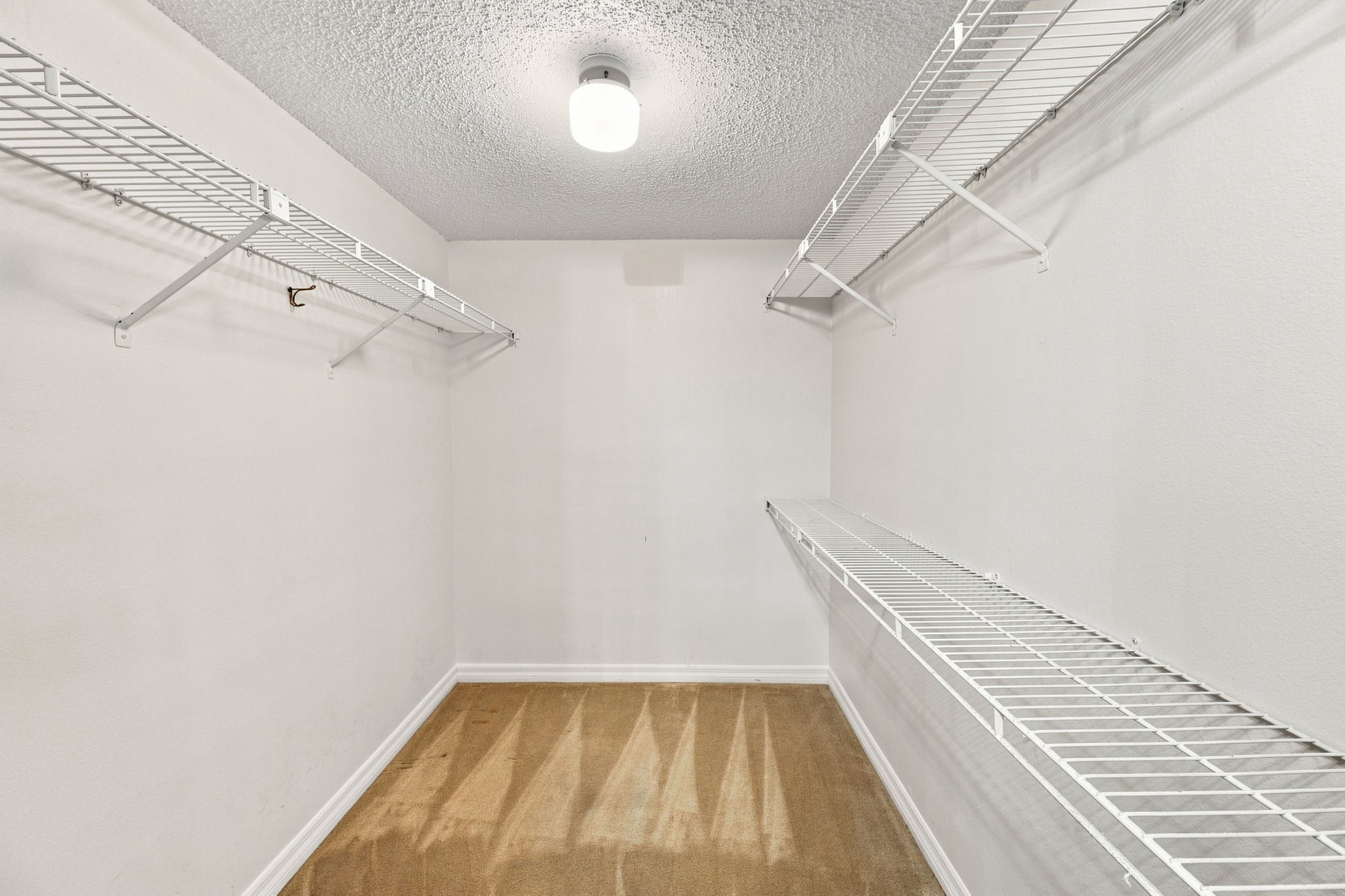 Primary Bedroom Walk-in Closet1