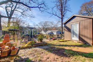 36 Exterior Rear E w Back Yard + Shed