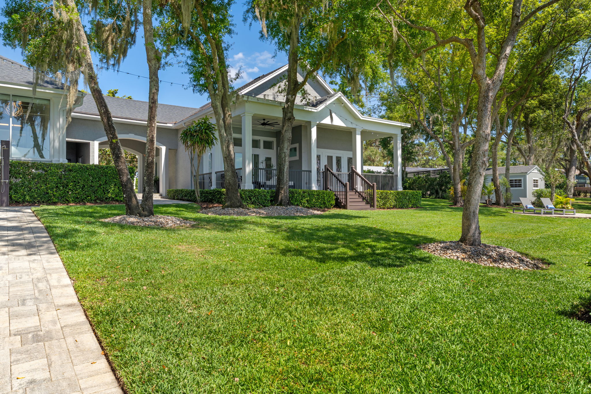 View of Guest House from Outdoor Living Area/Boat Dock