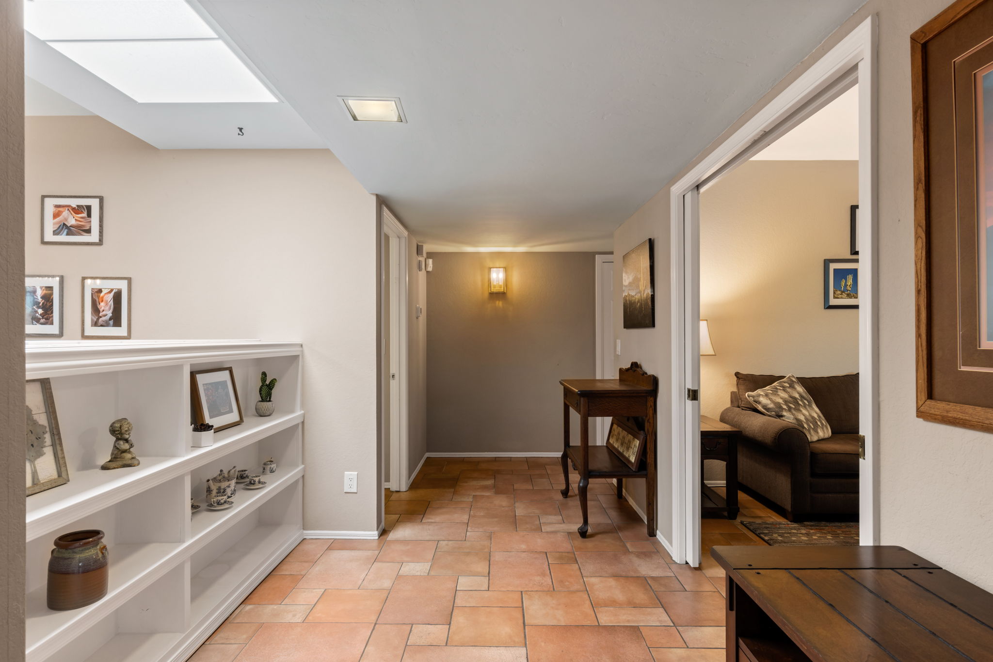 Leading to the den, primary bedroom, guest bedroom and bathroom