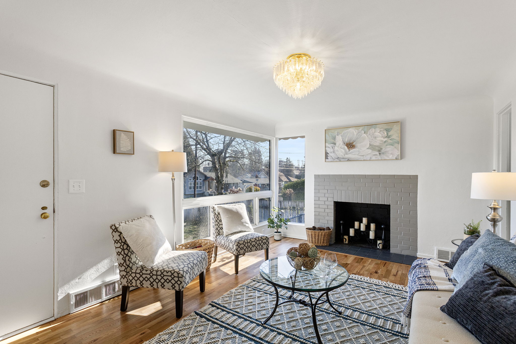 The fireplace anchors the room, creating an easy and comfortable setting for everyday living.