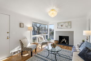 The fireplace anchors the room, creating an easy and comfortable setting for everyday living.