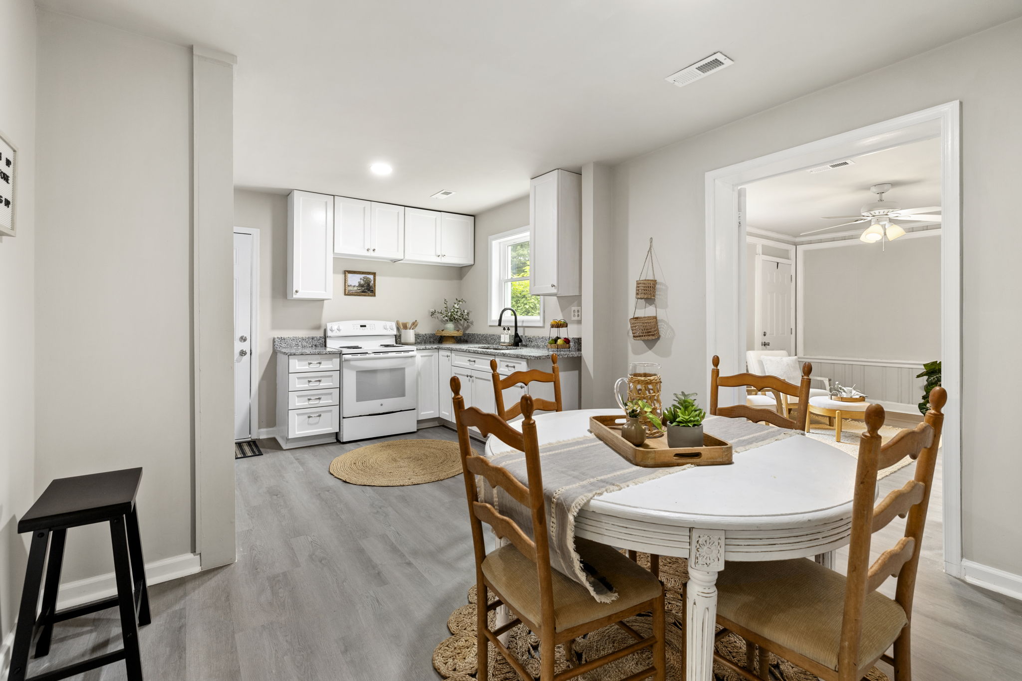 Dining area opens to the updated kitchen.