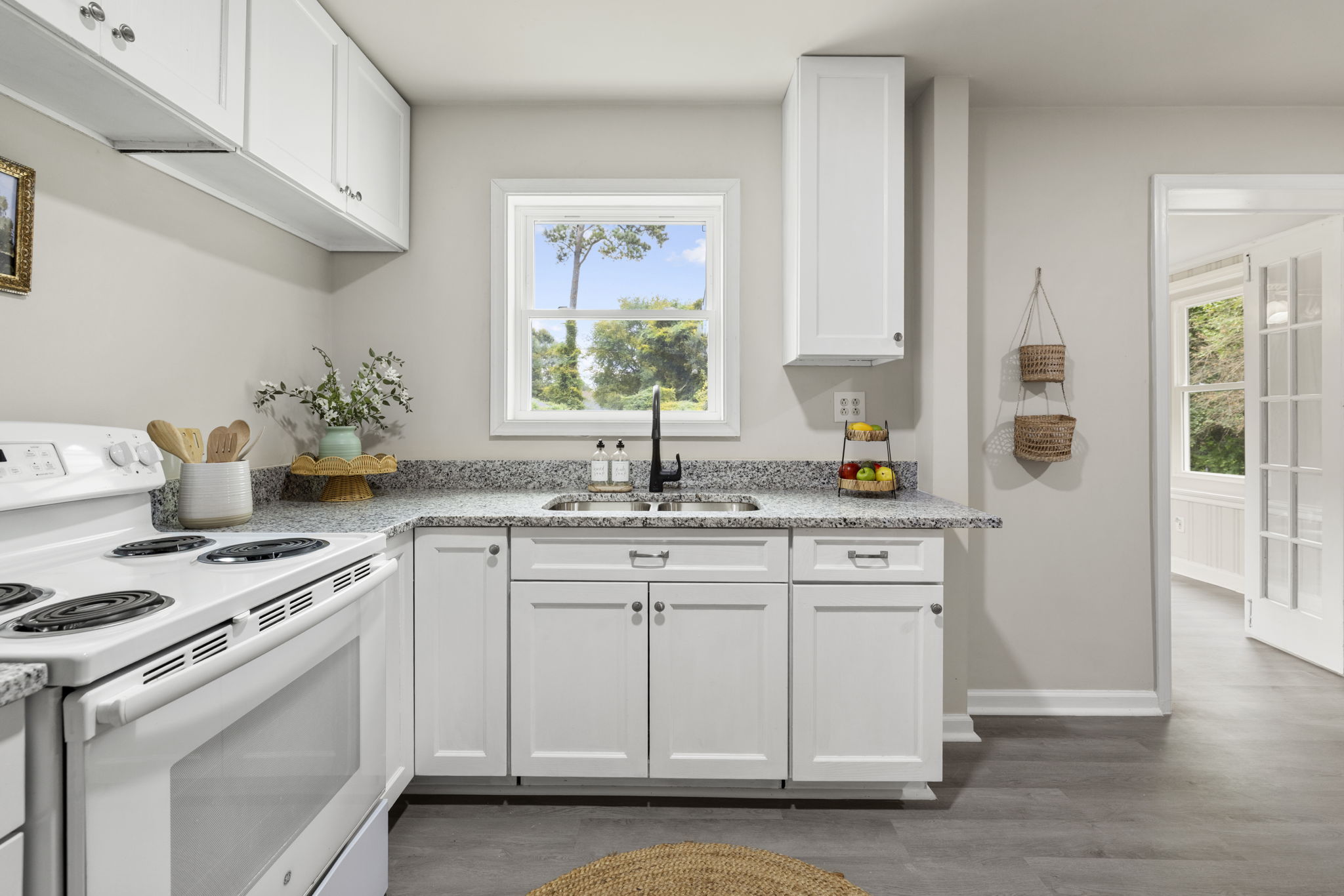 Brand new cabinets, granite counters, & sink faucet.