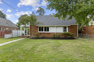 A low maintenance brick & aluminum exterior with new roof in 2024.