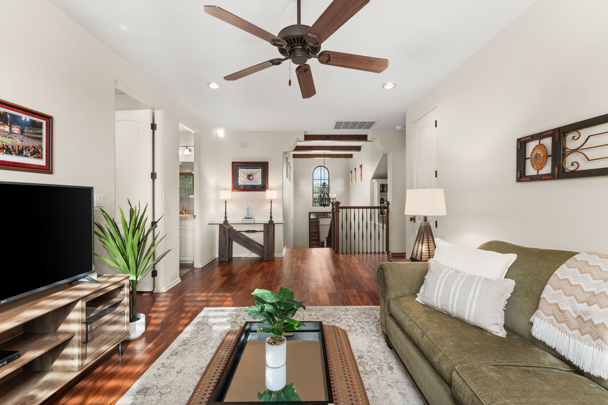 Ready to slip away? Settle into the upstairs living room. (YES! This is the 3rd living room space.)