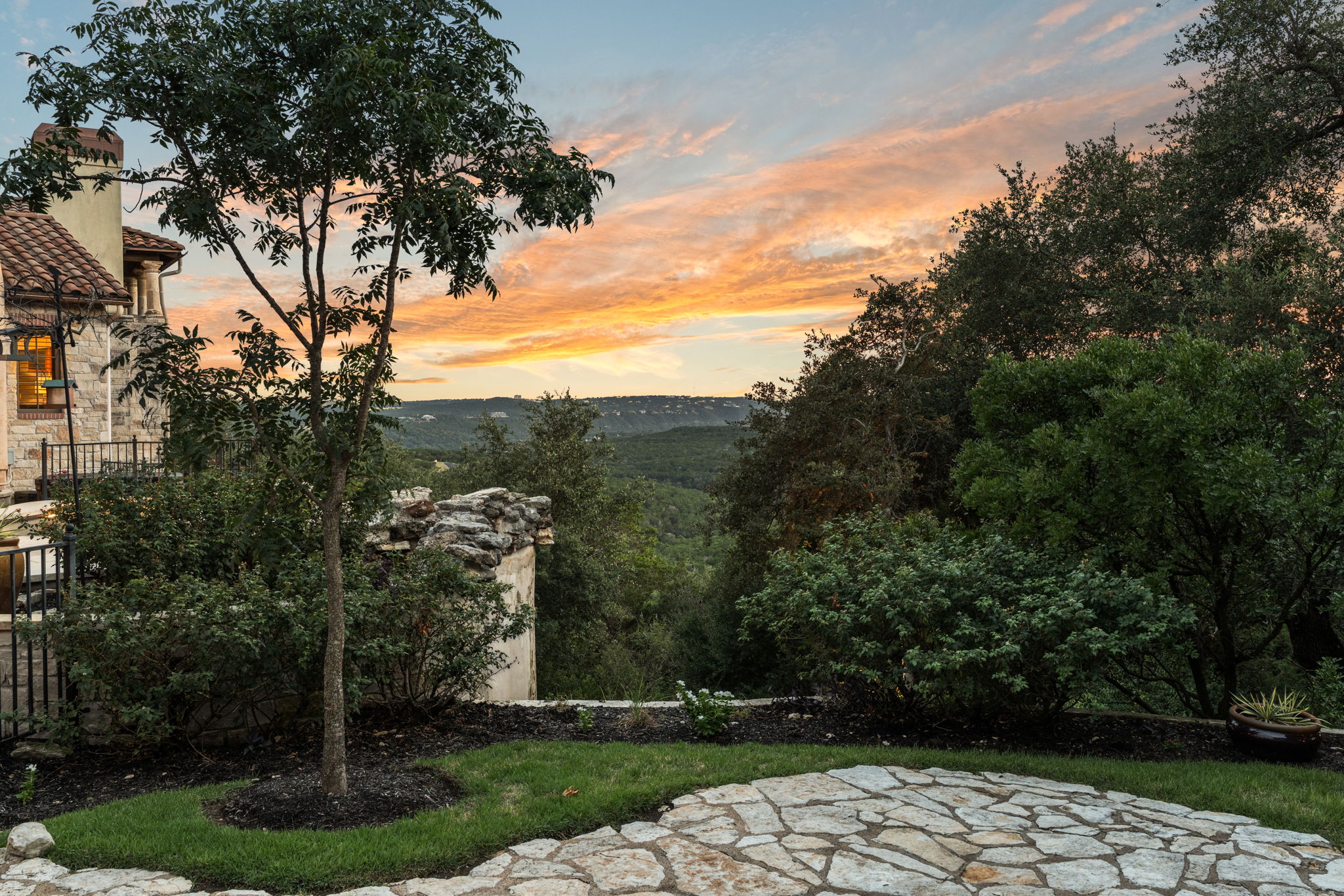 Relax and enjoy the fully fenced, private backyard while watching the sunset from every angle.