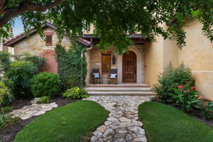 Welcome your guests through your beautifully landscaped courtyard.