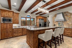 Double over, Wolf range, walk in pantry, and hidden coffee bar...the chef's kitchen sets you up to create amazing dishes for your friends and family.