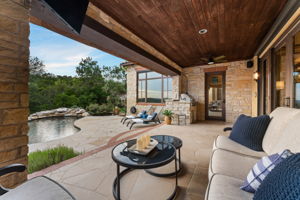 Access the covered patio from the primary bedroom, as well as from both of the downstairs living spaces.
