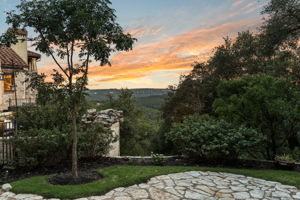 Relax and enjoy the fully fenced, private backyard while watching the sunset from every angle.