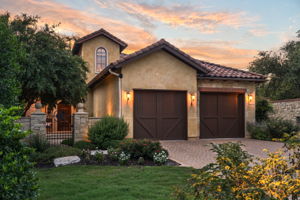 Lush, inviting yard is beautifully landscaped.