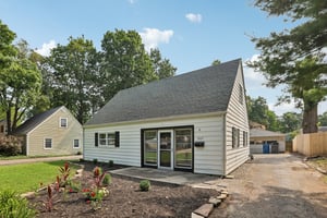 Fresh landscaping and a long private driveway create an inviting first impression from the moment you arrive.