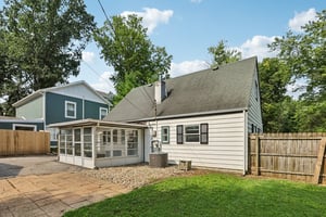 The generous fenced backyard offers plenty of space to garden, entertain, play, or simply unwind in the fresh air.