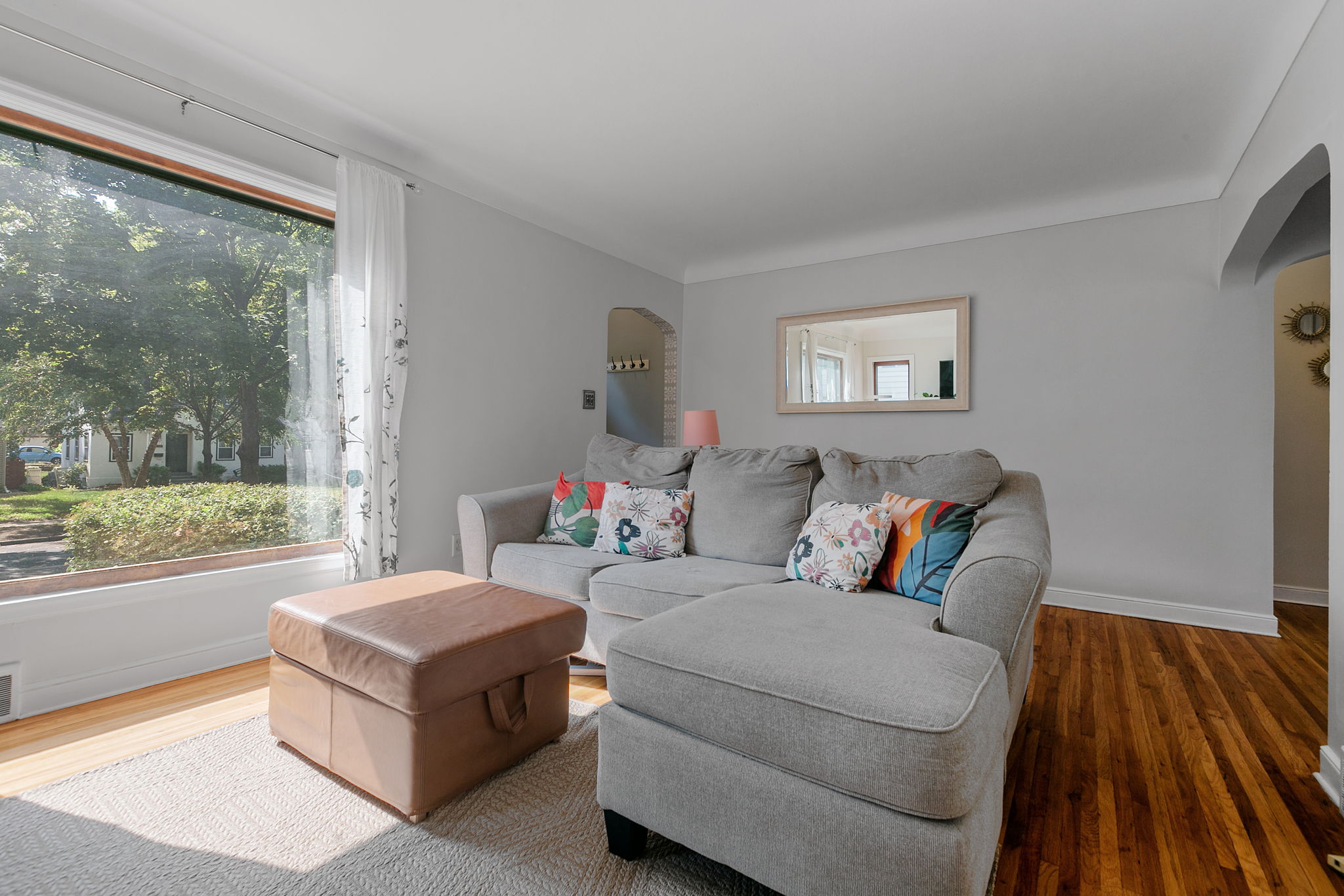 Upon entering the living room at 5549 27th Avenue S, you'll immediately be met with a wash of natural light, one of the consistent features throughout this home.