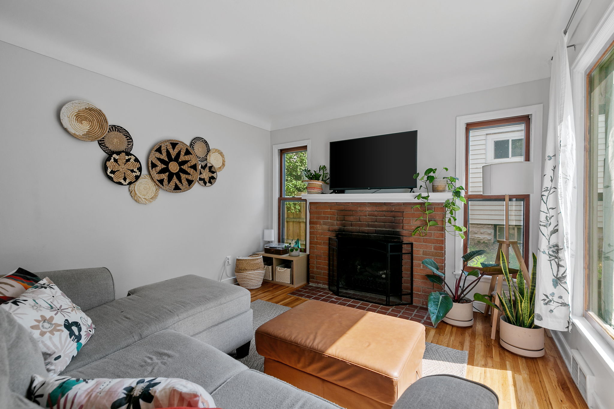 Upon entering the living room at 5549 27th Avenue S, you'll immediately be met with a wash of natural light, one of the consistent features throughout this home.