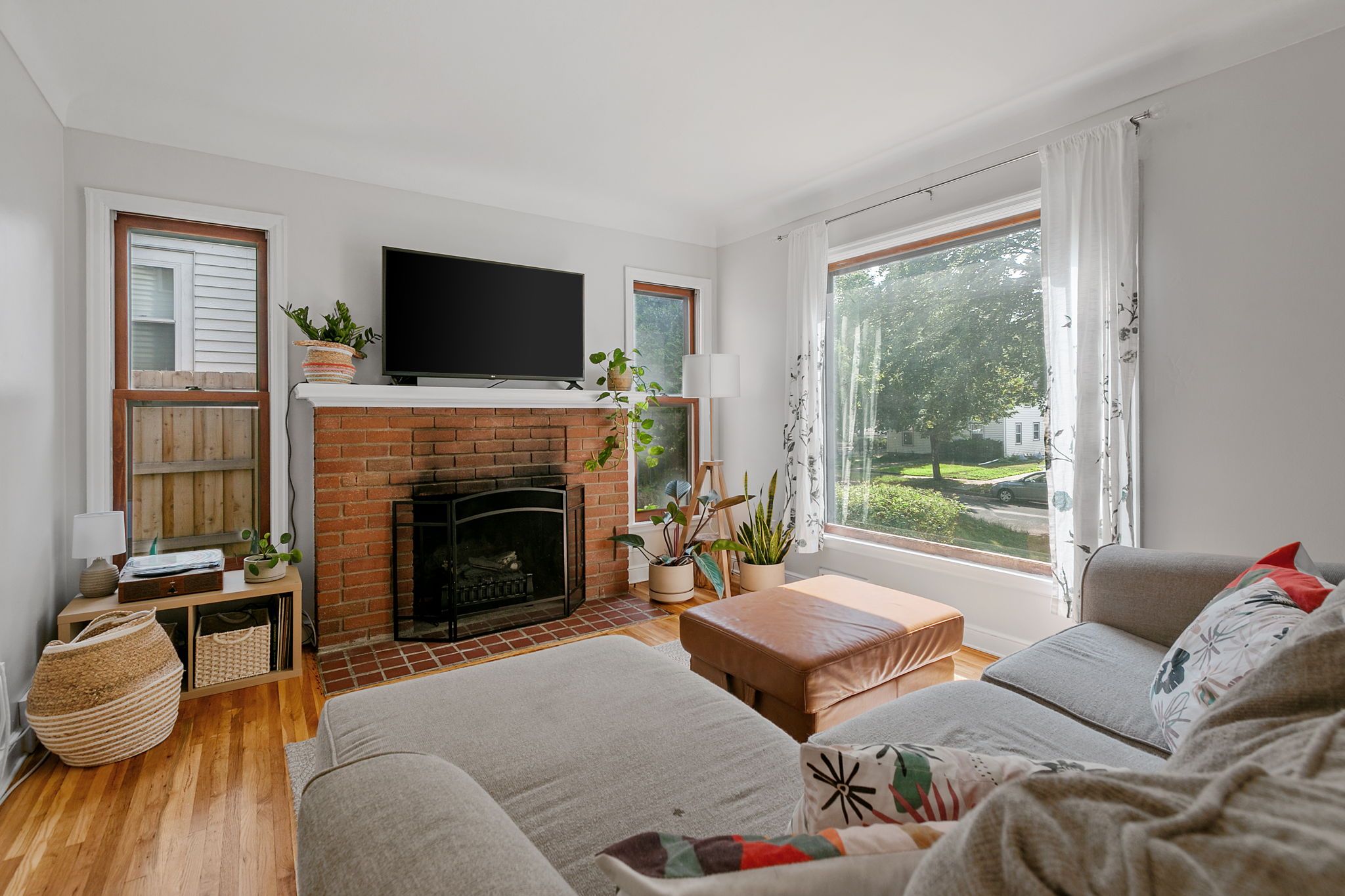 Upon entering the living room at 5549 27th Avenue S, you'll immediately be met with a wash of natural light, one of the consistent features throughout this home.