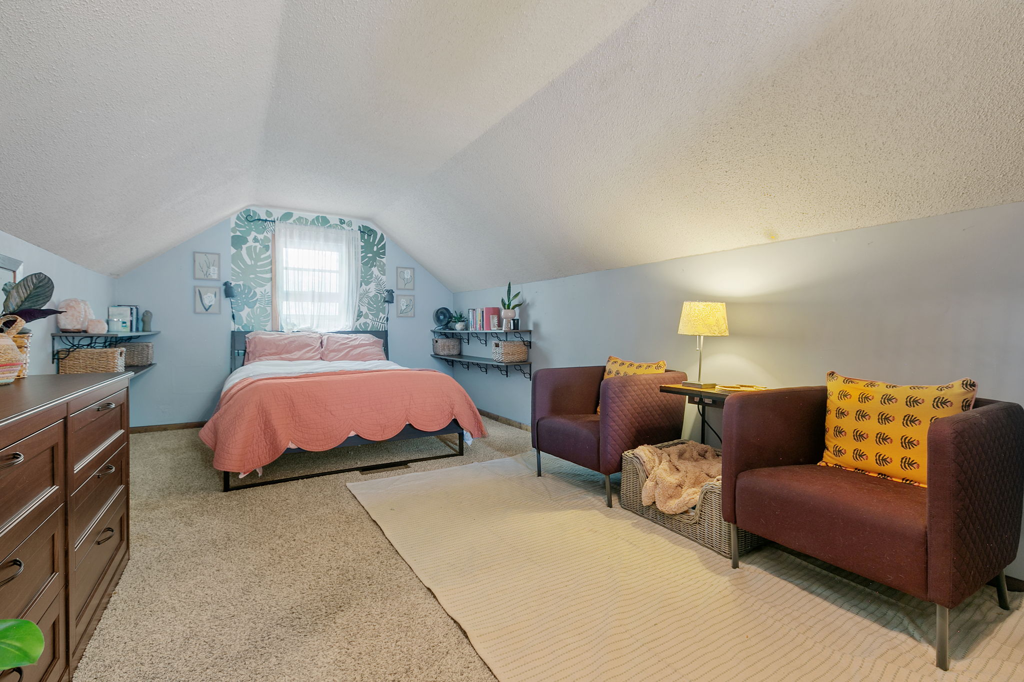With a ceiling height of 7' 5" at its apex, the upper-level half-story at 5549 27th Avenue S is tall and airy, which is hard to find in a late-1940s bungalow.