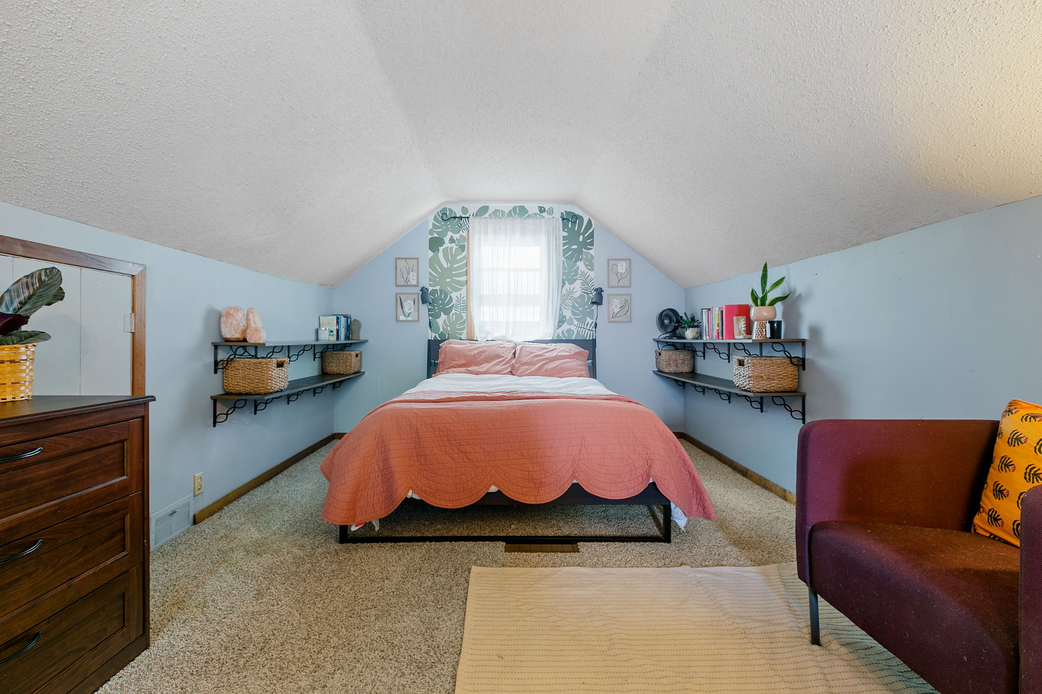 With a ceiling height of 7' 5" at its apex, the upper-level half-story at 5549 27th Avenue S is tall and airy, which is hard to find in a late-1940s bungalow.