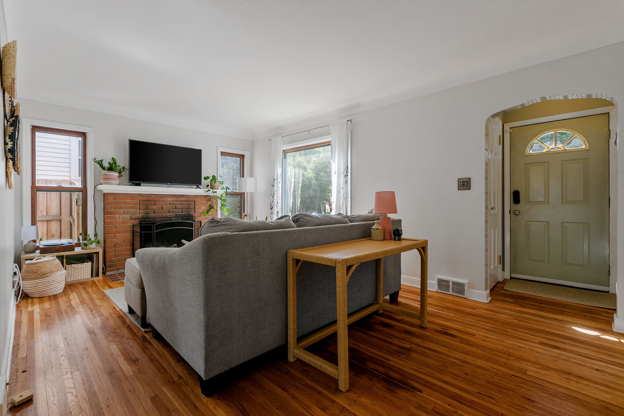 Upon entering the living room at 5549 27th Avenue S, you'll immediately be met with a wash of natural light, one of the consistent features throughout this home.