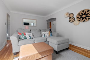 Upon entering the living room at 5549 27th Avenue S, you'll immediately be met with a wash of natural light, one of the consistent features throughout this home.