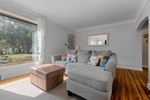 Upon entering the living room at 5549 27th Avenue S, you'll immediately be met with a wash of natural light, one of the consistent features throughout this home.