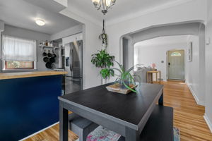 Expansive archways and direct lines of sight lend themselves to a feeling of openness at 5549 27th Avenue S.