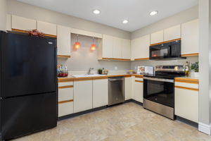 The Kitchen includes a nice eat-in area and plentiful cabinets. It has a brand new dishwasher and stove