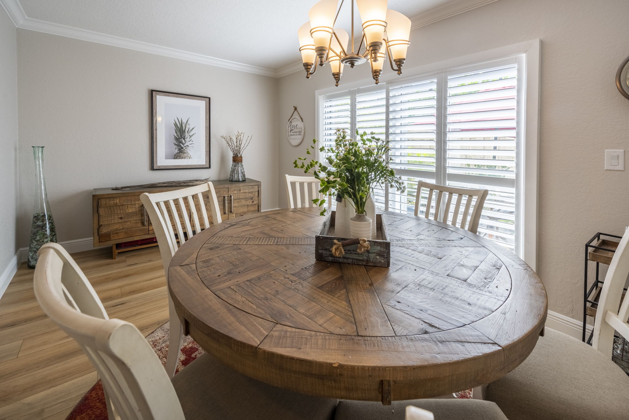 Dining area easily accommodates seating for six with room to spare.