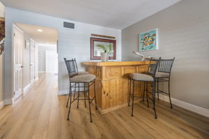 Custom bar for additional seating and entertaining.