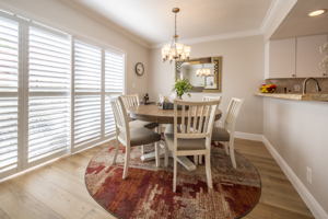 Beautiful new plantation shutters dress the sliders and all windows.