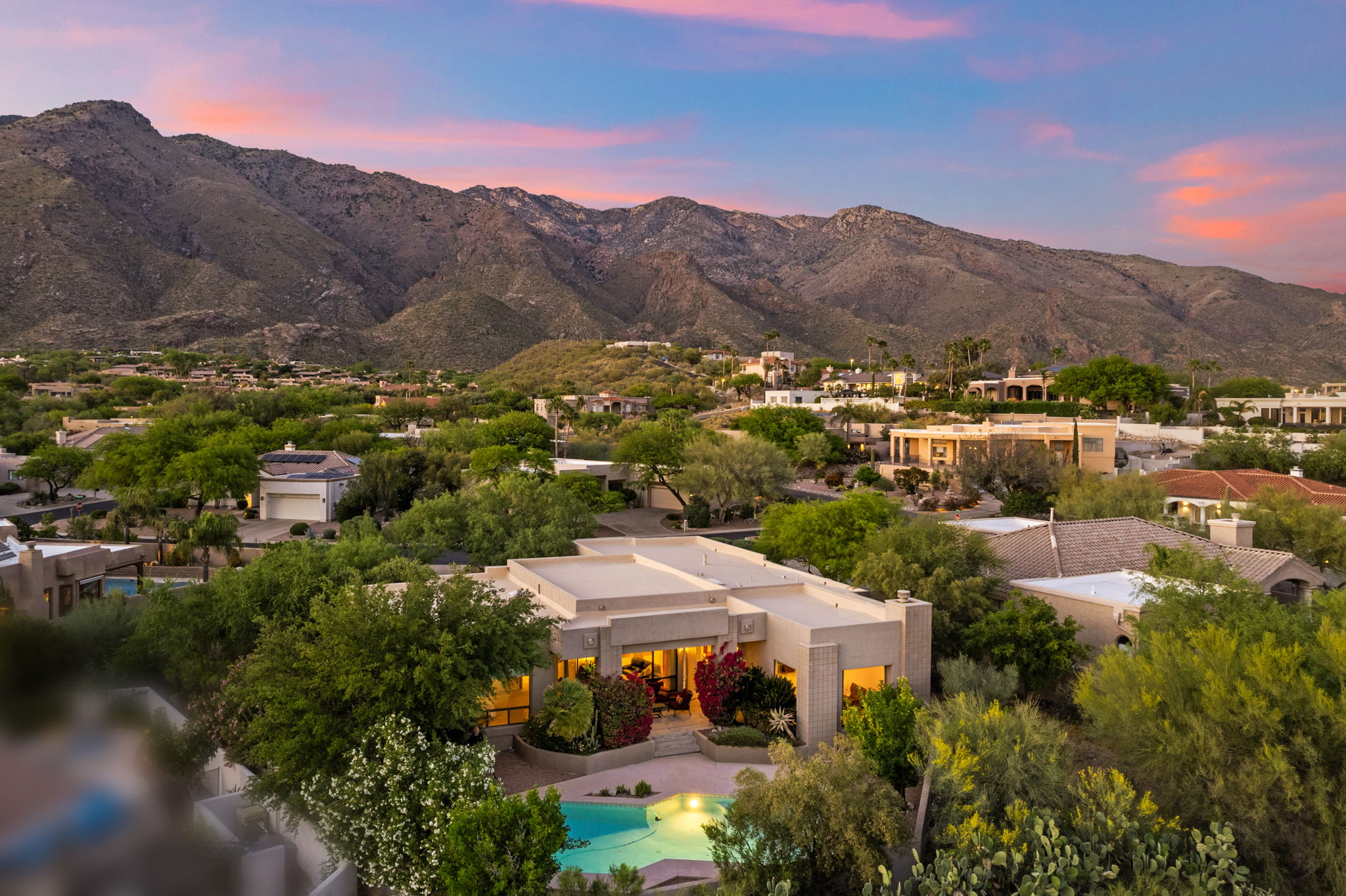 Aeril view of private backyard and Catalina Mountians at the front of the home