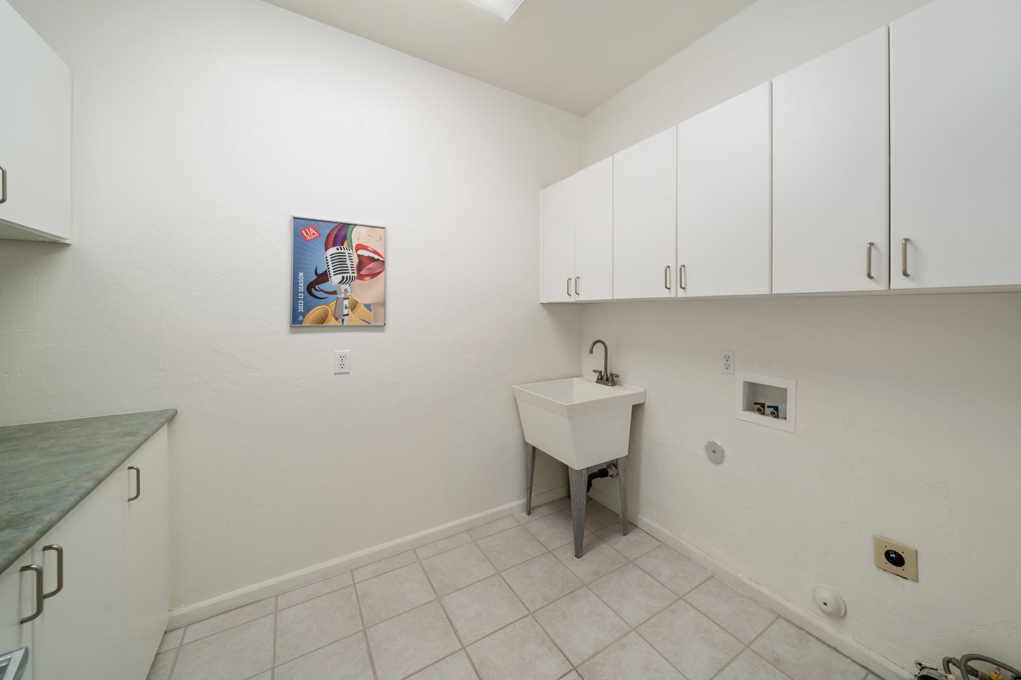 Laundry Room with sink and storage