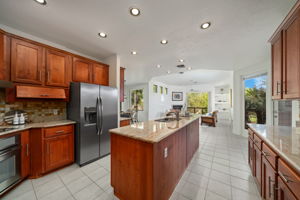 Large Kitchen with center island, granite counter tops and stainless appliances