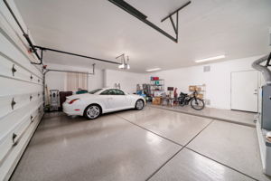 Extended two-car garage with epoxy flooring