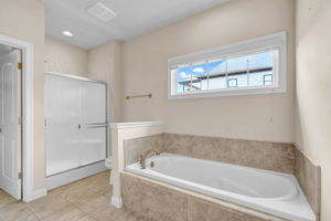 Glass Shower & Garden Tub in Primary Suite