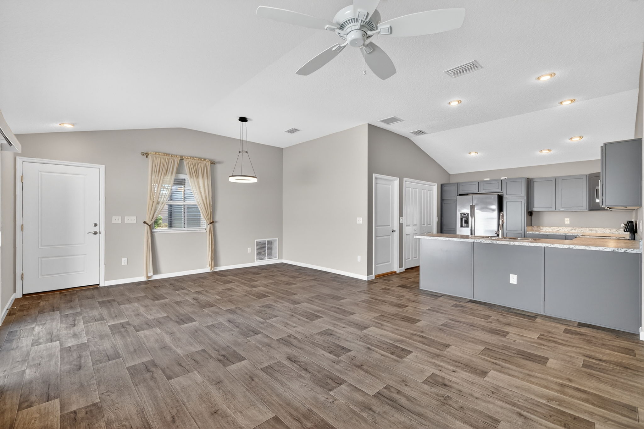 Kitchen, Living, and Dining Rooms