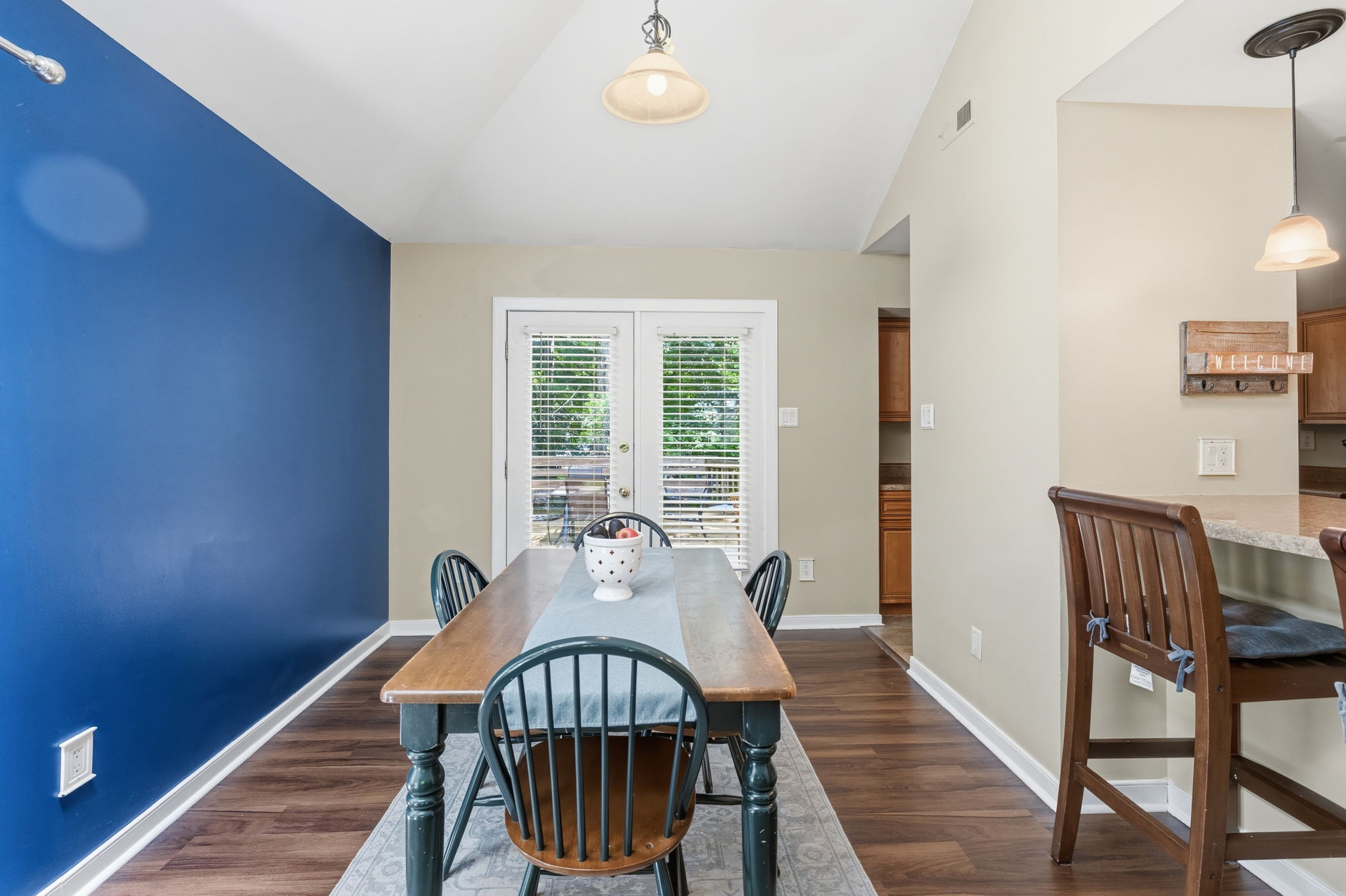 Dining room has access to the rear deck.