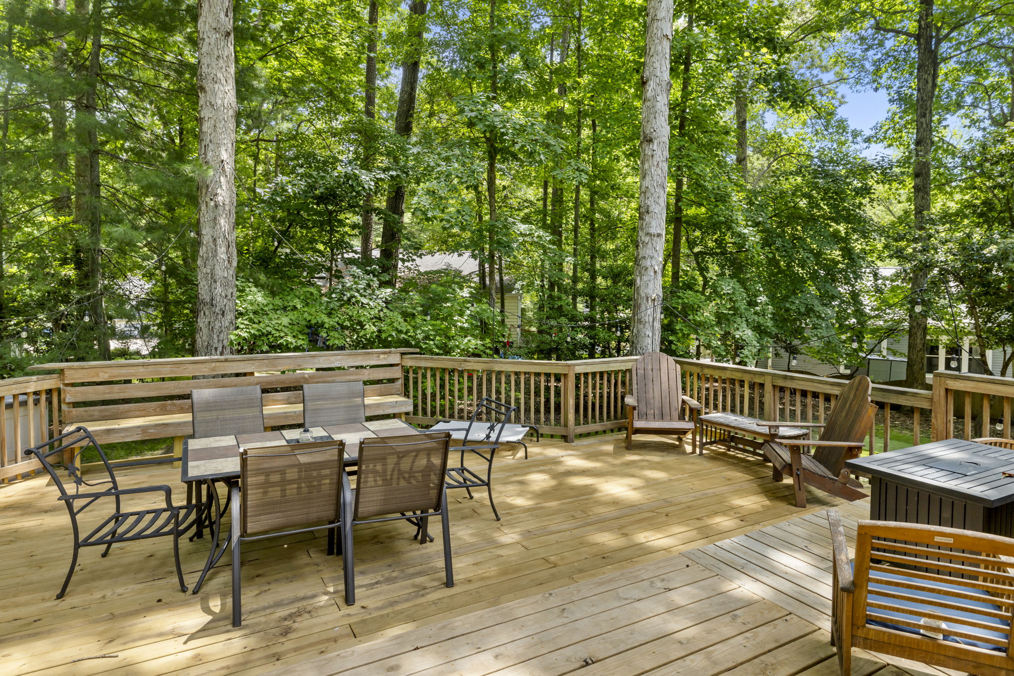 Large two level deck with recently replaced decking boards.